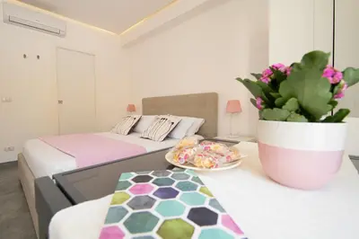 Letto o letti in una camera di Marene Residence
