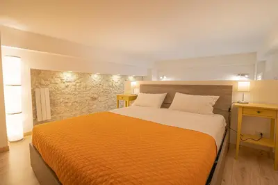 Letto o letti in una camera di Marene Residence