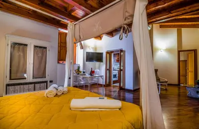 Letto o letti in una camera di La Casa di Ilde al Duomo - Ortigia Holidays
