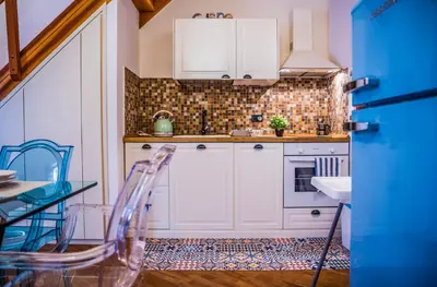 Cucina o angolo cottura di La Casa di Ilde al Duomo - Ortigia Holidays