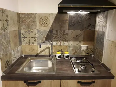 Cucina o angolo cottura di L'altro capo del filo