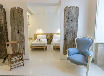 Letto o letti in una camera di Dione Apartments by Dimore in Sicily Ortigia