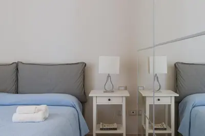 Letto o letti in una camera di Darsena Apartments by Wonderful Italy