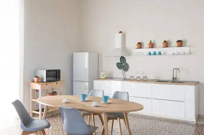 Cucina o angolo cottura di Darsena Apartments by Wonderful Italy