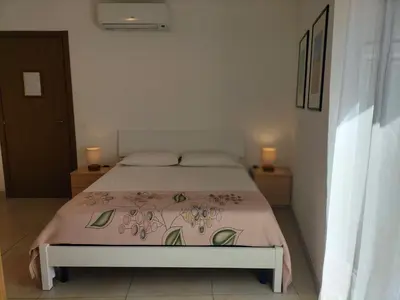 Letto o letti in una camera di San Filippo Neri - CAMERE