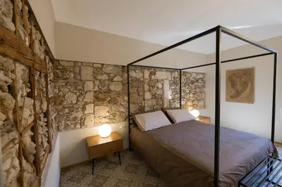 Letto o letti in una camera di Il Fuoco di Archimede - Ortigia