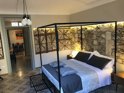 Letto o letti in una camera di Il Fuoco di Archimede - Ortigia