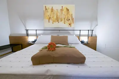 Letto o letti in una camera di Il Fuoco di Archimede - Ortigia