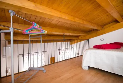 Letto o letti in una camera di Casa Daniela