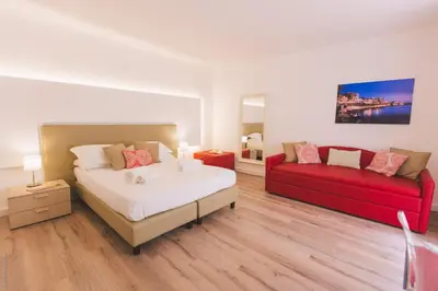Letto o letti in una camera di Dimore delle Zagare Ortigia