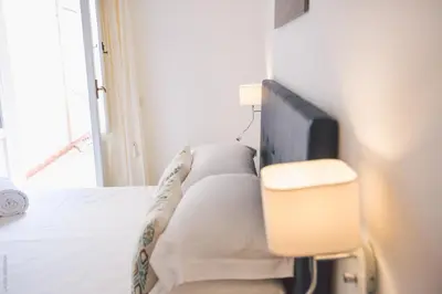 Letto o letti in una camera di Dimore delle Zagare Ortigia