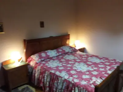 Letto o letti in una camera di Villa Giacoma