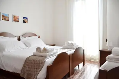 Letto o letti in una camera di B&B Gulliver