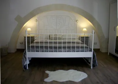 Letto o letti in una camera di Pied a Terre Aretusa