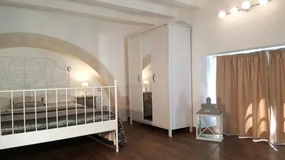 Letto o letti in una camera di Pied a Terre Aretusa