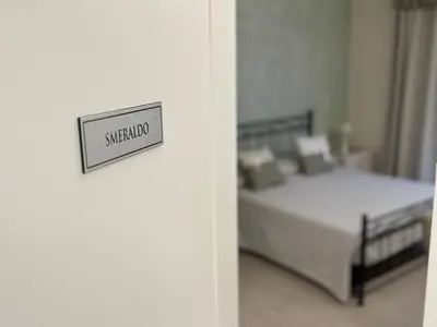 Letto o letti in una camera di Maison Bijou Guest House