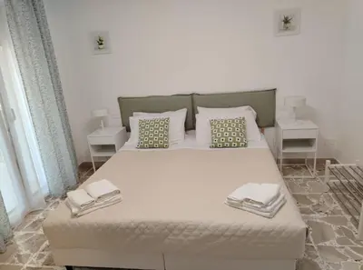 Letto o letti in una camera di Zenzero e Limone
