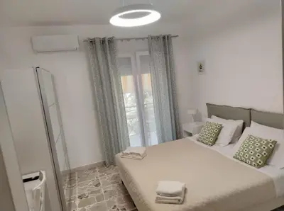 Letto o letti in una camera di Zenzero e Limone