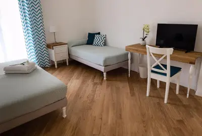 Letto o letti in una camera di Zenzero e Limone