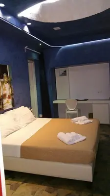Letto o letti in una camera di San Giorgio Modica Hotel