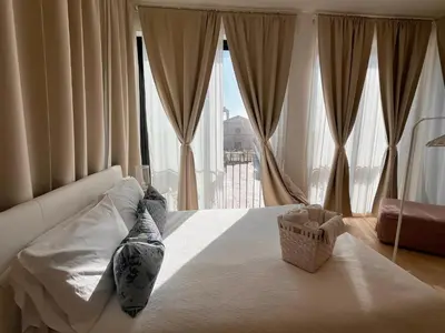 Letto o letti in una camera di Regina Margherita B&B