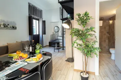Area soggiorno di SyracuseApartments ISONZO di SIRACUSA Stupendo appartamento vicino ad ORTIGIA e a 200m dal mare
