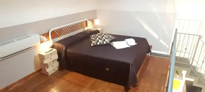 Letto o letti in una camera di SyracuseApartments ISONZO di SIRACUSA Stupendo appartamento vicino ad ORTIGIA e a 200m dal mare