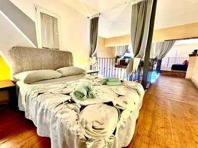 Letto o letti in una camera di Sakè Art Loft at the Dome