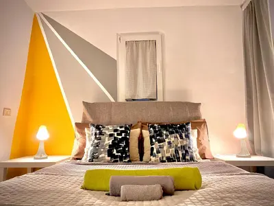 Letto o letti in una camera di Sakè Art Loft at the Dome
