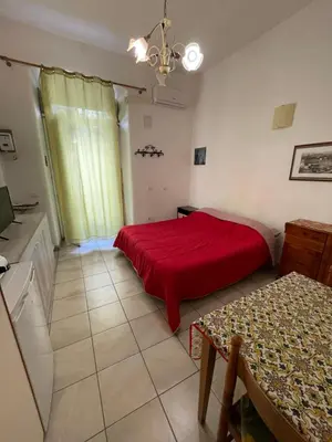 Letto o letti in una camera di Casa Teatro Greco