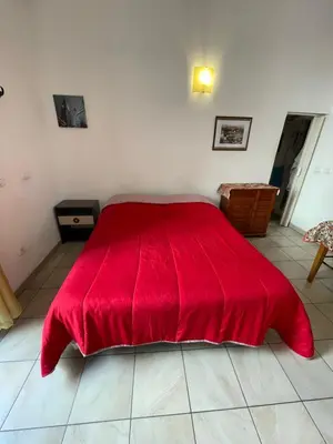 Letto o letti in una camera di Casa Teatro Greco