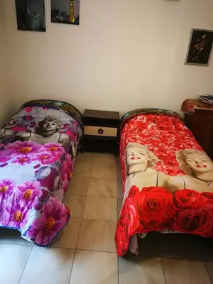Letto o letti in una camera di Casa Teatro Greco