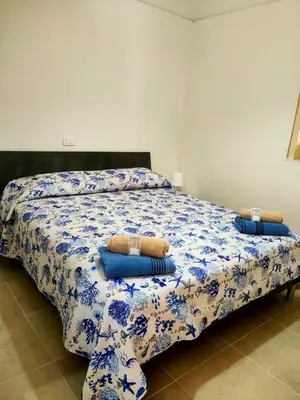 Letto o letti in una camera di Bed and fly Aeroporto Catania