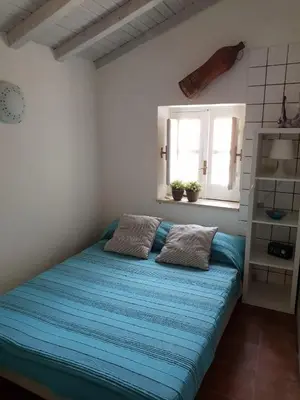 Letto o letti in una camera di Il Nido di Diana in Ortigia