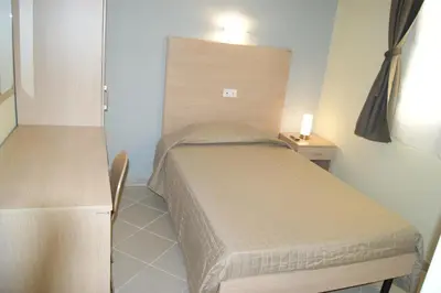Letto o letti in una camera di Guest House Golfo Xifonio