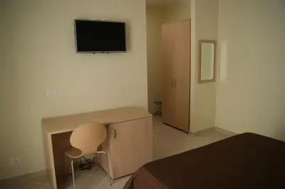 TV o dispositivi per l'intrattenimento presso Guest House Golfo Xifonio