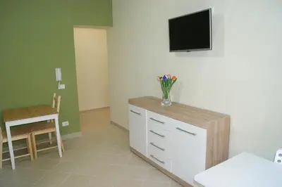 TV o dispositivi per l'intrattenimento presso Guest House Golfo Xifonio