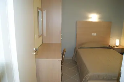 Letto o letti in una camera di Guest House Golfo Xifonio