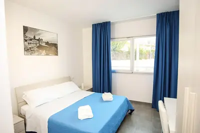 Letto o letti in una camera di Il Maestrale B&b