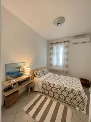 Letto o letti in una camera di Villa sul Mare