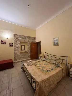 Letto o letti in una camera di B&b Candido Vacanze