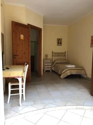 Letto o letti in una camera di B&b Candido Vacanze