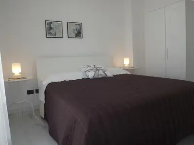 Letto o letti in una camera di Appartanvilla Savalè