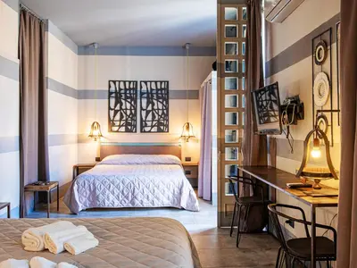 Letto o letti in una camera di Design 4 Rooms