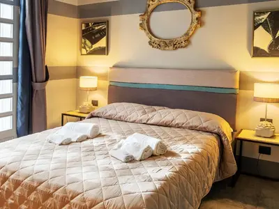 Letto o letti in una camera di Design 4 Rooms