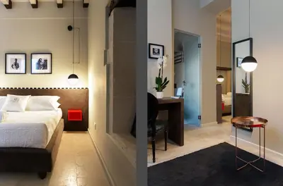 Letto o letti in una camera di CinqueSuites Ortigia