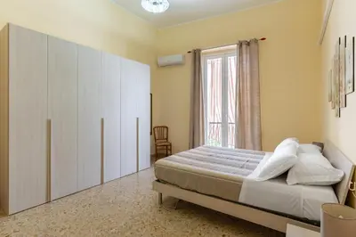 Letto o letti in una camera di La Casa dei Nonni by Wonderful Italy
