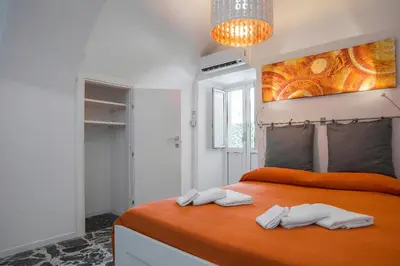 Letto o letti in una camera di Fèdeli House City