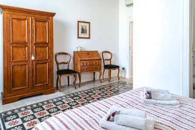 Letto o letti in una camera di Appartamento Calarossa