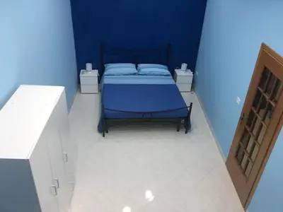 Letto o letti in una camera di La Casa di Simone